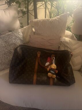 Authentic Louis Vuitton Monogram Travel Holdall in Brown and Tan
